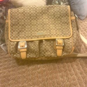 Coach purse, used as a small diaper bag.